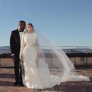 Kim Kardashian Appears in Wedding Dress and Veil for Kanye West Donda Event [Photos]