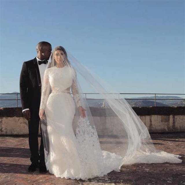 Kim Kardashian Appears in Wedding Dress and Veil for Kanye West Donda Event [Photos]