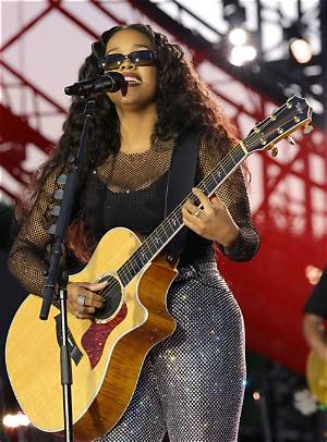 Who Is Gabi Wilson, Why Is She Referred to as H. E. R and What Does It Stand for?
